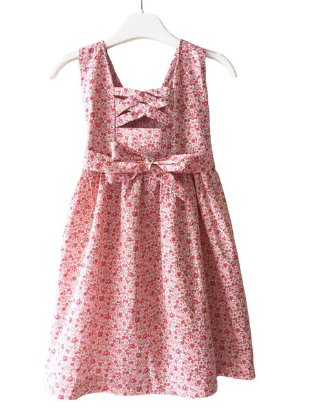 Robe smocks enfant fille fleuri rose dos ouvert croisillons