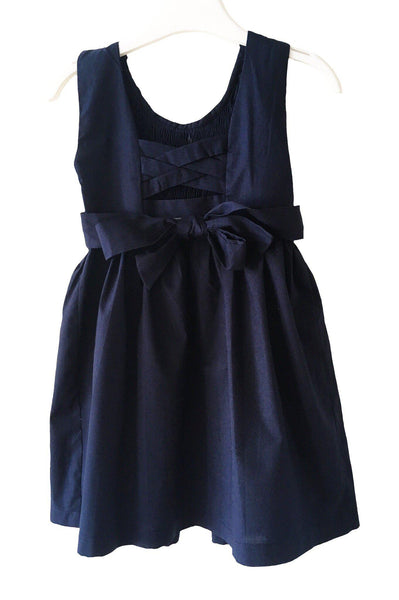 Robe smocks enfant fille bleu marine dos ouvert croisillons