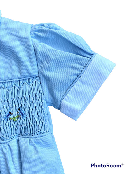 Barboteuse smocks "Iris" Bleu ciel col blanc