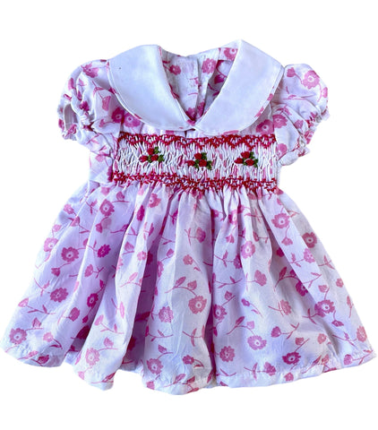 Poupon Gaëlle noir robe Fuschia à volants Univers Poupées - La boutique des  Poupées et des Poupons